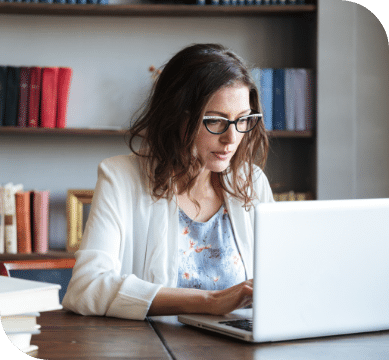 A woman working at her computer.