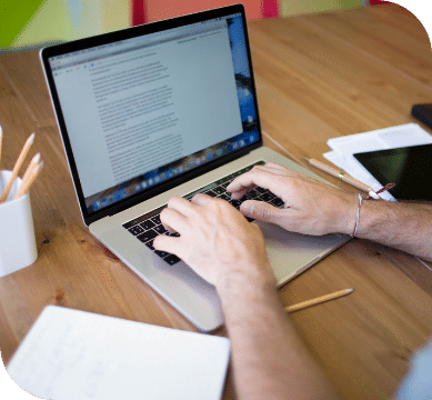 A person working at their laptop