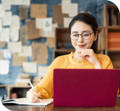 A woman working at her computer.