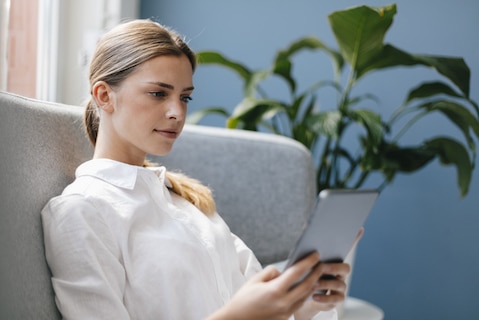 girl using electronic book
